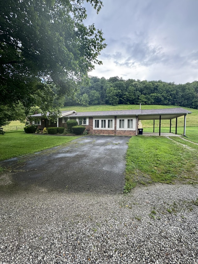 3911 Old Bottom Rd, Lafayette, TN 37083 - view of front facade featuring asphalt driveway and a front yard