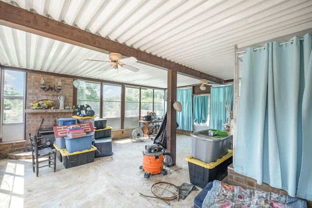 1211 Haber Dr, Brentwood, TN 37027 - sunroom / solarium featuring a ceiling fan and a wood stove