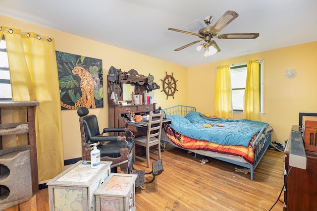 1211 Haber Dr, Brentwood, TN 37027 - bedroom featuring wood finished floors and a ceiling fan