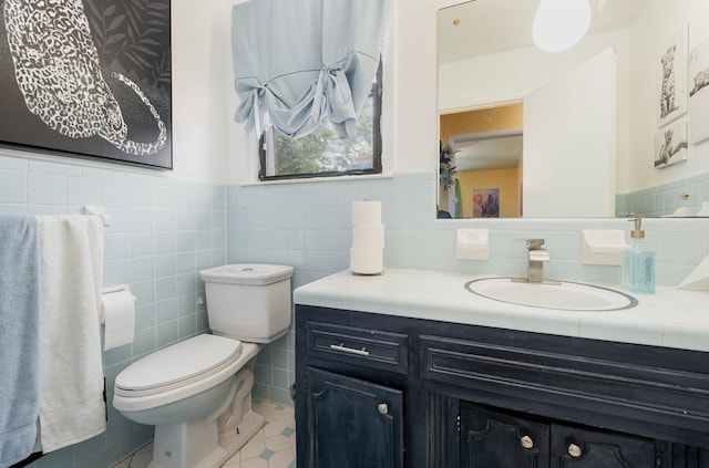 1211 Haber Dr, Brentwood, TN 37027 - bathroom featuring tile walls, vanity, and wainscoting