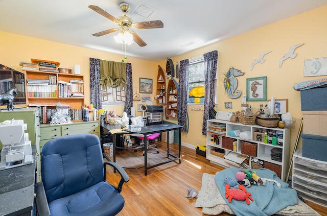 1211 Haber Dr, Brentwood, TN 37027 - home office with wood finished floors and a ceiling fan