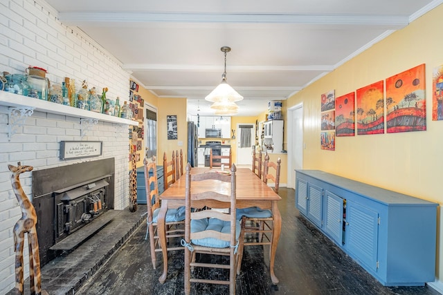 1211 Haber Dr, Brentwood, TN 37027 - dining space with beam ceiling, a fireplace, ornamental molding, dark wood-style floors, and brick wall
