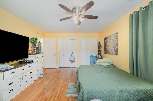 1211 Haber Dr, Brentwood, TN 37027 - bedroom with multiple closets, light wood-type flooring, and ceiling fan
