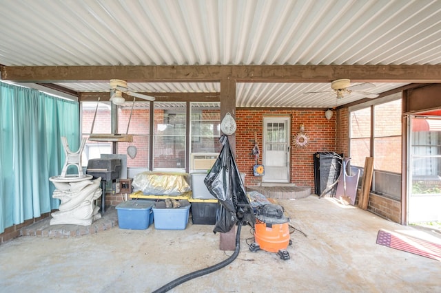 1211 Haber Dr, Brentwood, TN 37027 - unfurnished sunroom with a wood stove and ceiling fan