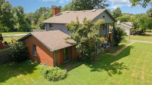1211 Haber Dr, Brentwood, TN 37027 - view of property exterior featuring a chimney, brick siding, and roof with shingles