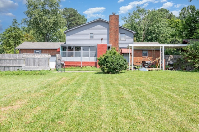 1211 Haber Dr, Brentwood, TN 37027 - back of property with a sunroom, a chimney, and brick siding