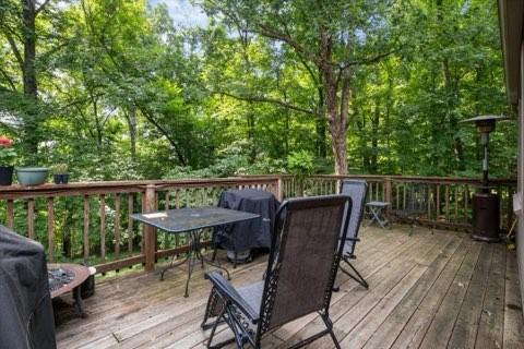 101 Cedar Hill Dr, Waverly, TN 37185 - wooden terrace with outdoor dining area