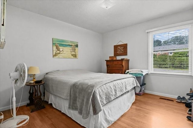 101 Cedar Hill Dr, Waverly, TN 37185 - bedroom with wood finished floors and baseboards