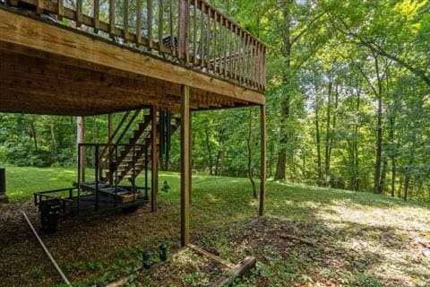 101 Cedar Hill Dr, Waverly, TN 37185 - view of grassy yard with stairs and a deck