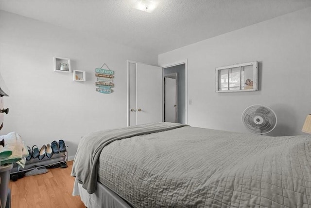 101 Cedar Hill Dr, Waverly, TN 37185 - bedroom featuring wood finished floors and a textured ceiling