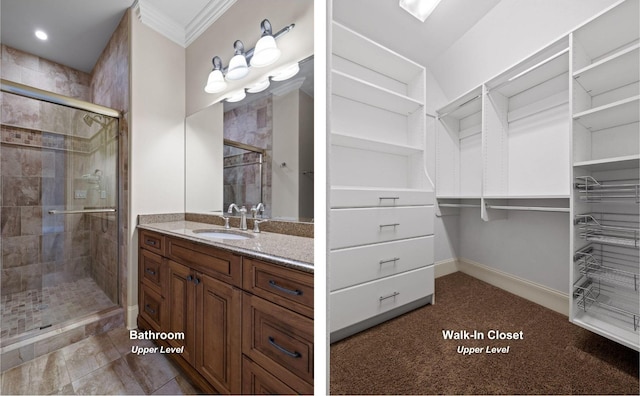 11 Saint Nicholas Way, Signal Mountain, TN 37377 - bathroom featuring a shower stall, ornamental molding, vanity, and a spacious closet