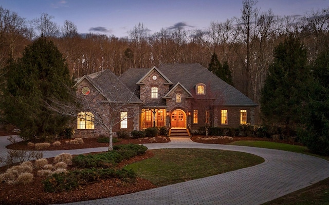 11 Saint Nicholas Way, Signal Mountain, TN 37377 - view of front of house featuring curved driveway, stone siding, and a yard