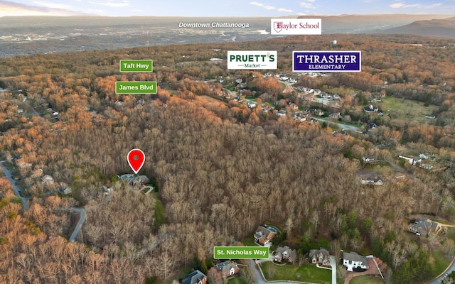 11 Saint Nicholas Way, Signal Mountain, TN 37377 - aerial overview of property's location featuring a heavily wooded area and a mountain backdrop