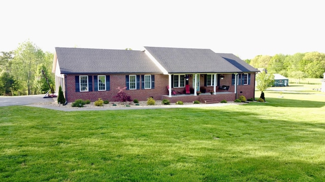 273 Old Coleytown Ln, Lafayette, TN 37083 - ranch-style home featuring covered porch, brick siding, and a front lawn