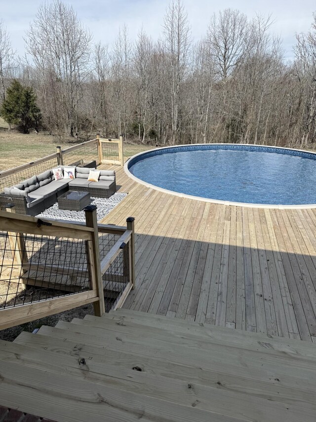 273 Old Coleytown Ln, Lafayette, TN 37083 - outdoor pool featuring an outdoor hangout area and a wooden deck