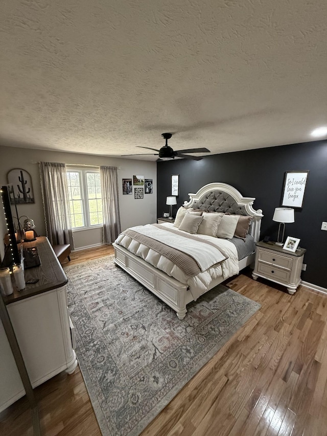 273 Old Coleytown Ln, Lafayette, TN 37083 - bedroom with wood finished floors, a textured ceiling, and ceiling fan