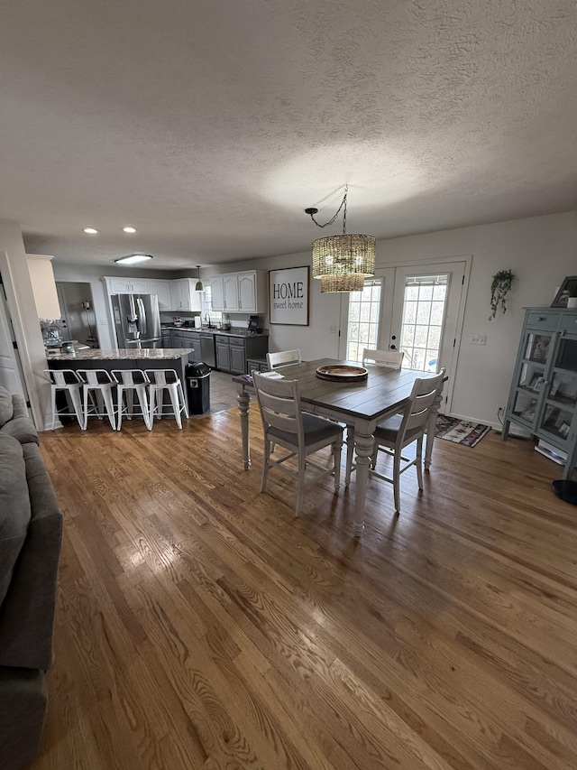 273 Old Coleytown Ln, Lafayette, TN 37083 - dining area with a textured ceiling, dark wood finished floors, a chandelier, and recessed lighting