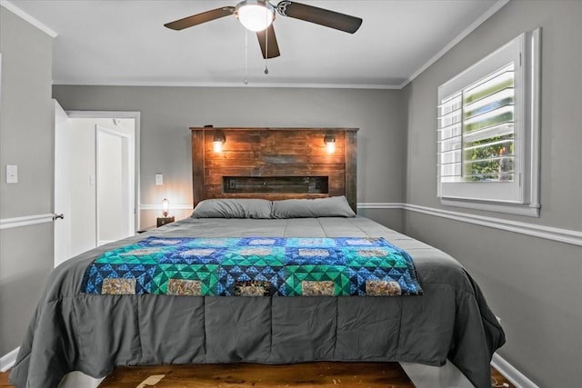 215 Sunset Dr, New Johnsonville, TN 37134 - bedroom featuring ornamental molding, wood finished floors, and ceiling fan