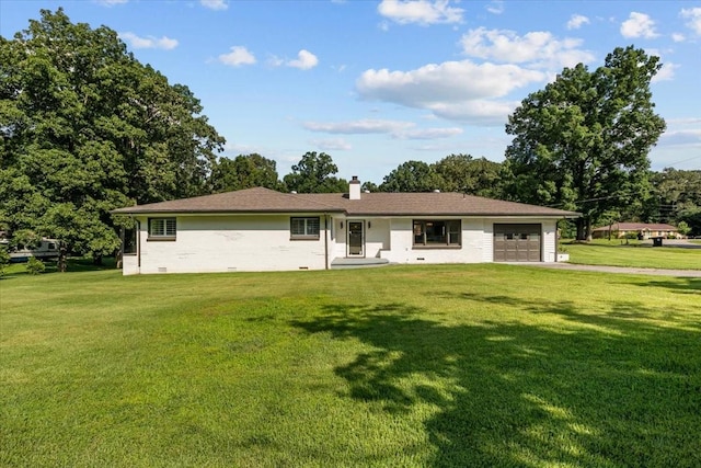 215 Sunset Dr, New Johnsonville, TN 37134 - ranch-style house with a front yard, an attached garage, and a chimney