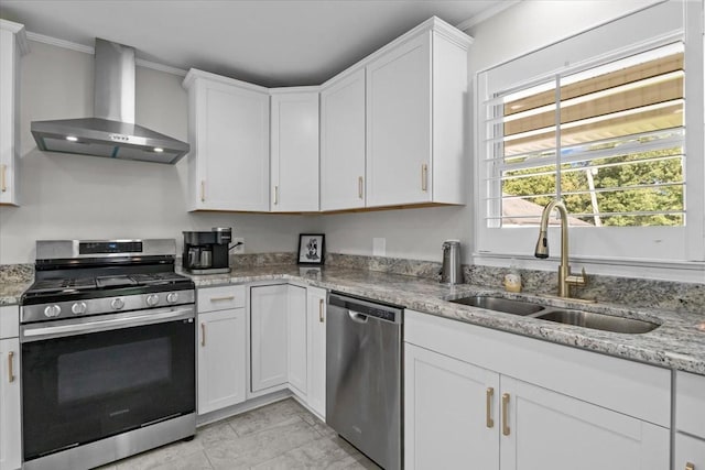 215 Sunset Dr, New Johnsonville, TN 37134 - kitchen with stainless steel appliances, wall chimney range hood, white cabinets, ornamental molding, and light stone counters