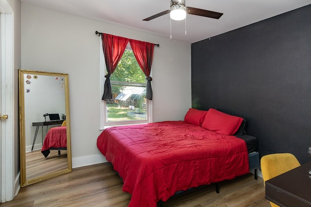 614 Joshua Dr, Clarksville, TN 37042 - bedroom with wood finished floors and a ceiling fan
