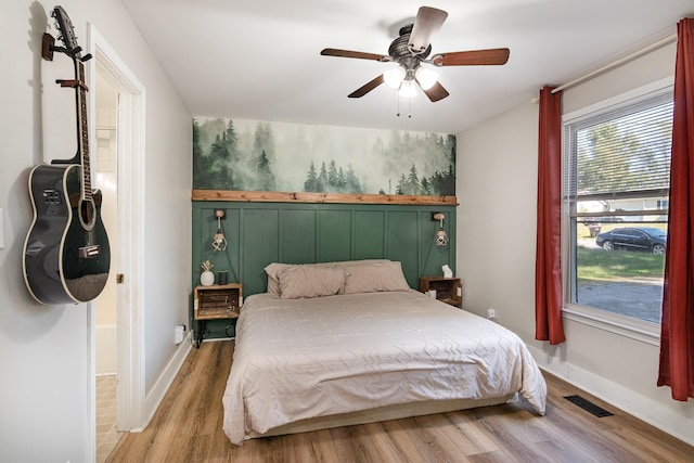 614 Joshua Dr, Clarksville, TN 37042 - bedroom with light wood-type flooring and a ceiling fan