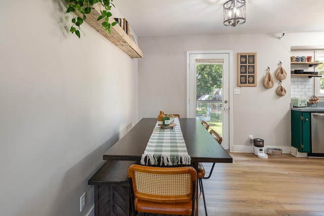 614 Joshua Dr, Clarksville, TN 37042 - dining space with light wood-type flooring and a chandelier