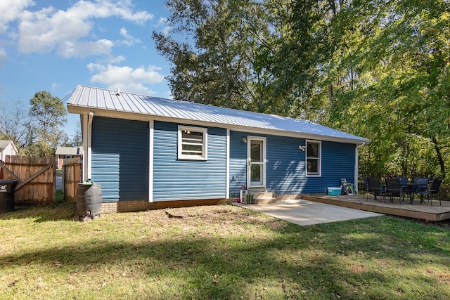 614 Joshua Dr, Clarksville, TN 37042 - back of property with a metal roof, a patio area, and entry steps