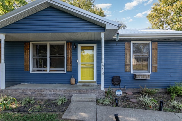 614 Joshua Dr, Clarksville, TN 37042 - view of front of house featuring a porch and a metal roof