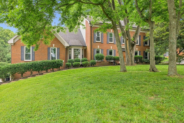 9214 Hunterboro Dr, Brentwood, TN 37027 - colonial inspired home with brick siding and a front yard