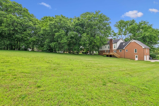 9214 Hunterboro Dr, Brentwood, TN 37027 - view of green lawn with stairs and a wooden deck