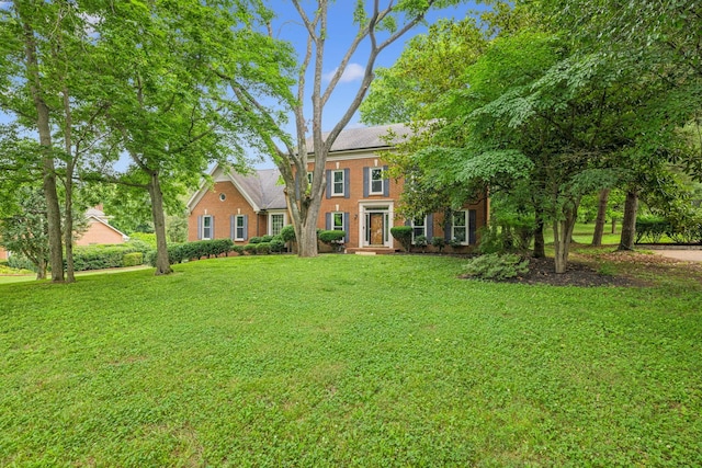 9214 Hunterboro Dr, Brentwood, TN 37027 - view of front facade featuring a front yard and brick siding