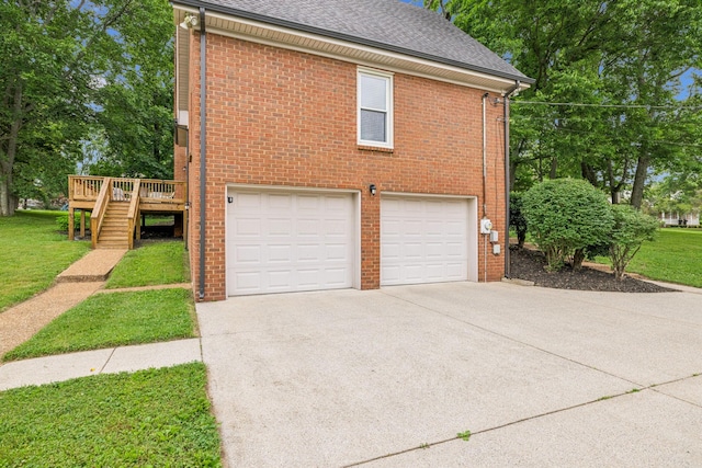 9214 Hunterboro Dr, Brentwood, TN 37027 - view of property exterior with a garage, concrete driveway, a shingled roof, brick siding, and a deck