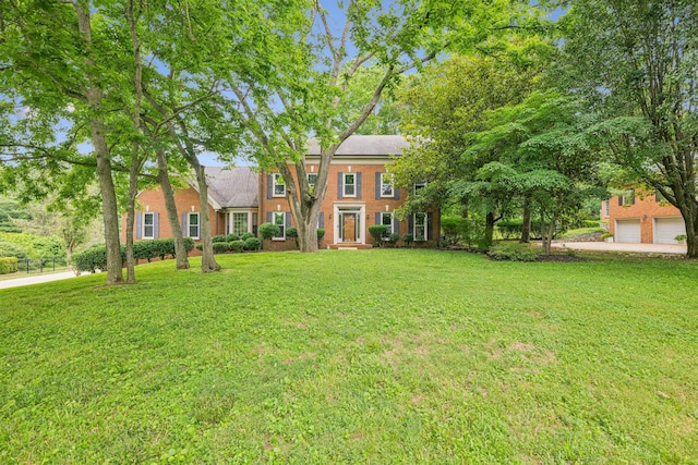9214 Hunterboro Dr, Brentwood, TN 37027 - view of front of home with a front yard and brick siding