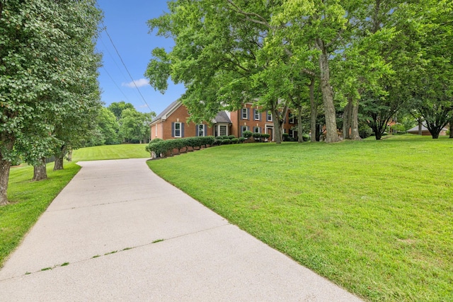 9214 Hunterboro Dr, Brentwood, TN 37027 - view of front facade featuring a front lawn and concrete driveway