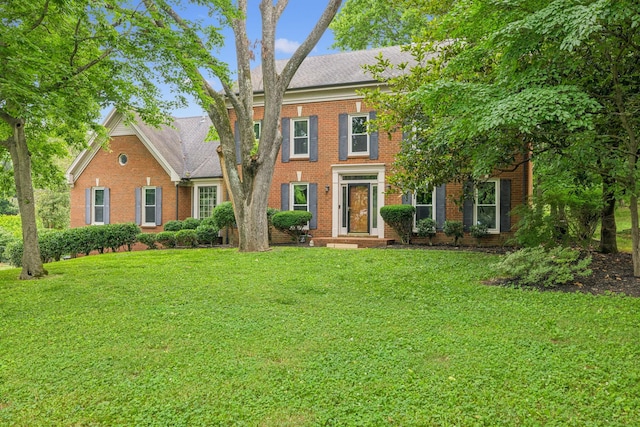 9214 Hunterboro Dr, Brentwood, TN 37027 - view of front facade with brick siding, a front lawn, and a shingled roof