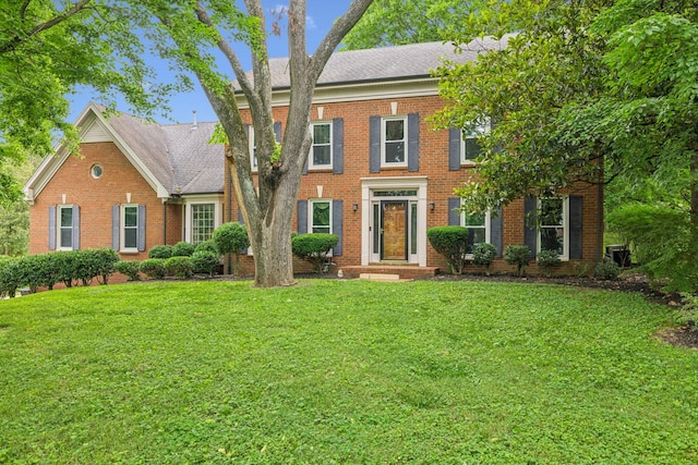 9214 Hunterboro Dr, Brentwood, TN 37027 - view of front of property featuring brick siding, a front yard, and a shingled roof