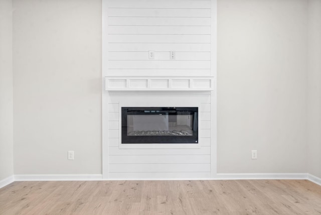 1220 Boulder Pass Rd, Clarksville, TN 37040 - detailed view of wood finished floors and a large fireplace