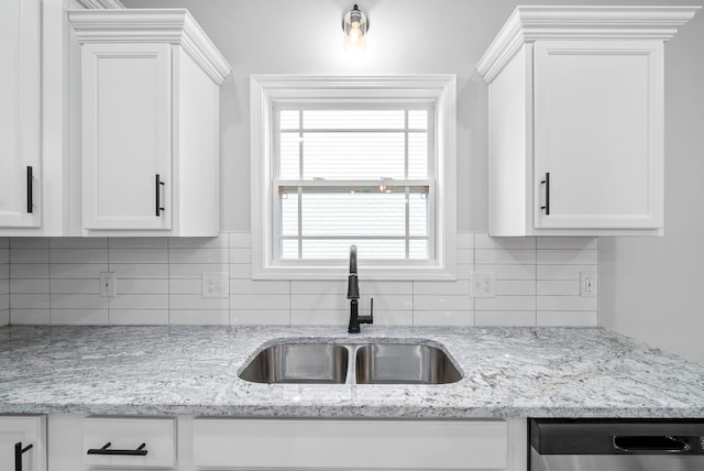 1204 Boulder Pass Rd, Clarksville, TN 37040 - kitchen featuring dishwasher, white cabinets, tasteful backsplash, and light stone counters