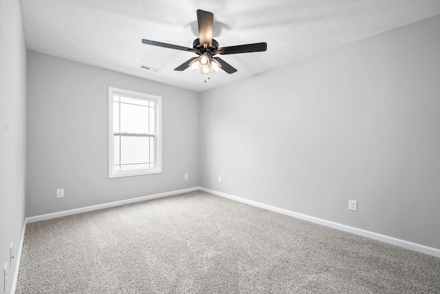 1204 Boulder Pass Rd, Clarksville, TN 37040 - empty room with carpet, a ceiling fan, and a textured ceiling