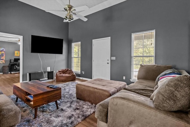 7173 New Hope Rd, Fairview, TN 37062 - living area featuring a ceiling fan, wood finished floors, high vaulted ceiling, and an office area