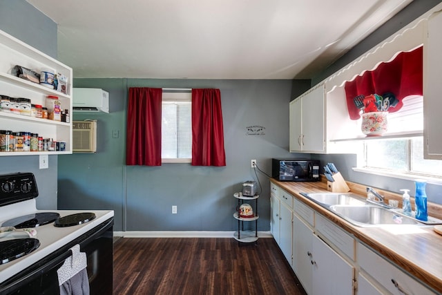 1532 Santa Fe Pike, Columbia, TN 38401 - kitchen with range with electric cooktop, black microwave, dark wood-style flooring, and white cabinets