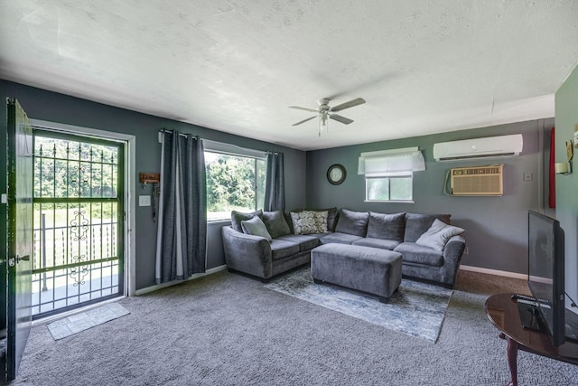 1532 Santa Fe Pike, Columbia, TN 38401 - carpeted living room with an AC wall unit, a ceiling fan, a textured ceiling, and a wall mounted air conditioner