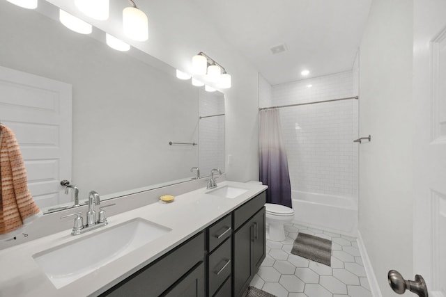 373 Hammock Ln, Spring Hill, TN 37174 - bathroom featuring tile patterned flooring, double vanity, shower / bath combo with shower curtain, and recessed lighting