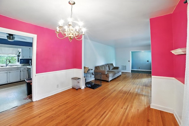 5125 Seward Rd, Brentwood, TN 37027 - living area featuring a chandelier and light wood-type flooring