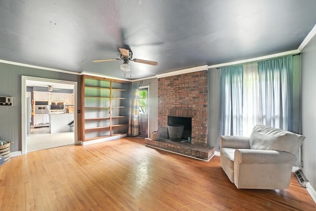 5125 Seward Rd, Brentwood, TN 37027 - living area with crown molding, ceiling fan, and wood finished floors