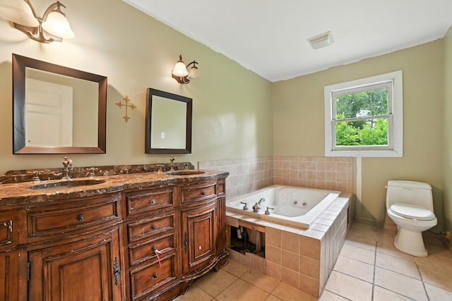 5125 Seward Rd, Brentwood, TN 37027 - bathroom with double vanity, a tub with jets, and tile patterned floors