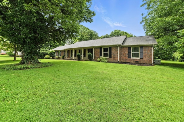 5125 Seward Rd, Brentwood, TN 37027 - ranch-style house with a front yard, brick siding, and roof with shingles