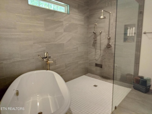 115 Bent Oak Ter, Crossville, TN 38558 - bathroom featuring a freestanding tub and walk in shower