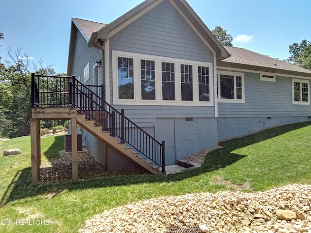 115 Bent Oak Ter, Crossville, TN 38558 - view of property exterior featuring stairs, a yard, crawl space, and a wooden deck